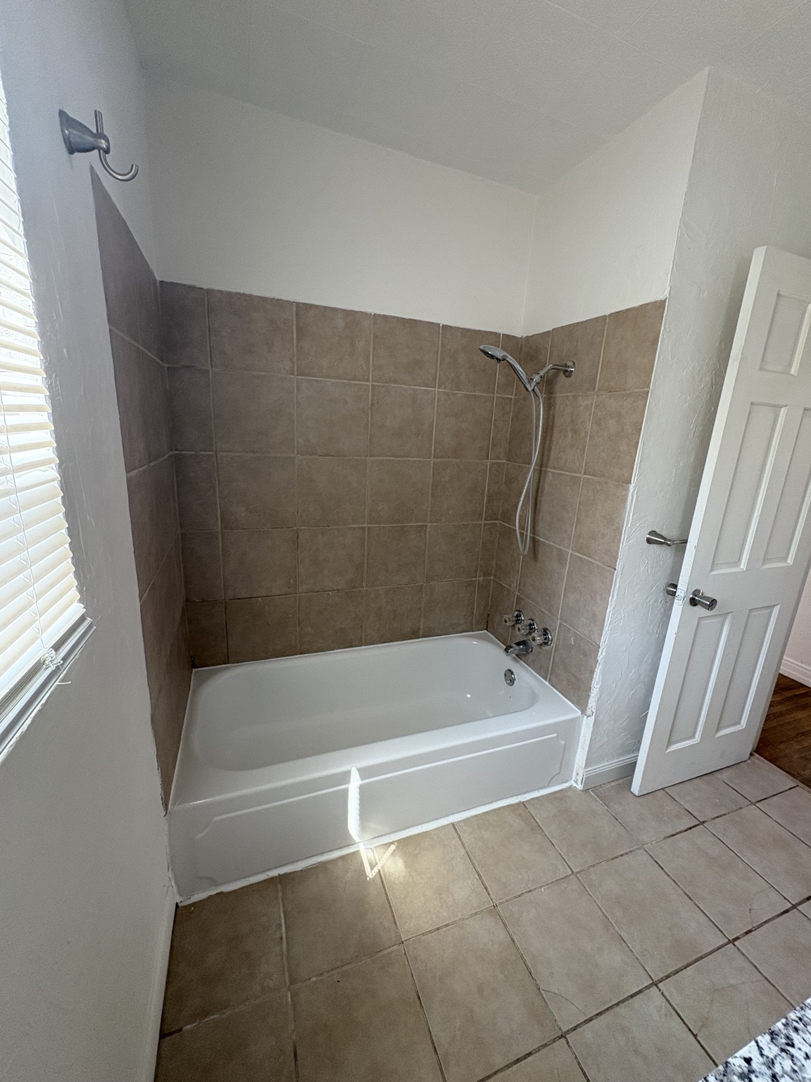 Bathtub and shower at 4011 S Tyler St.